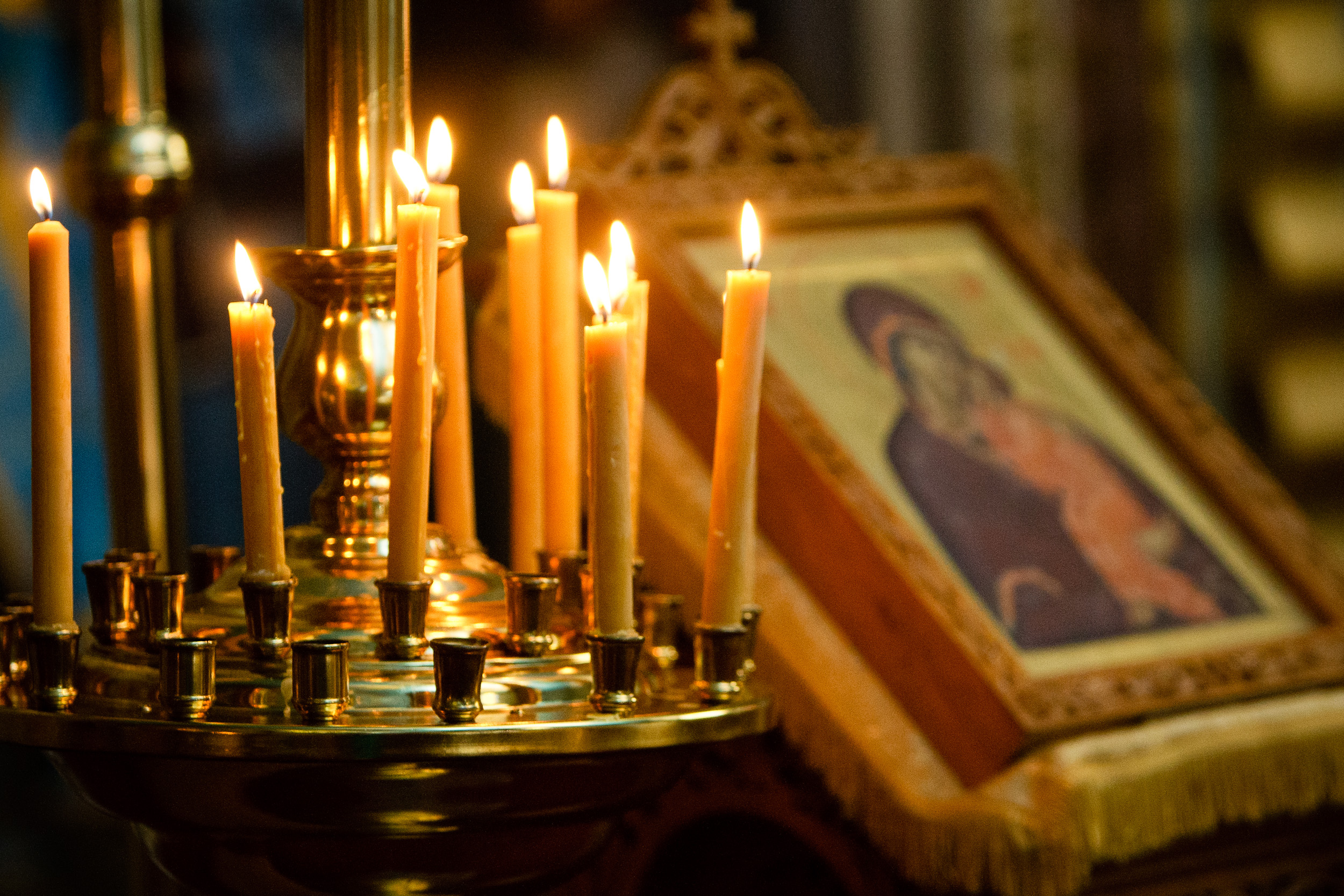 Candles burning before Orthodox icons
